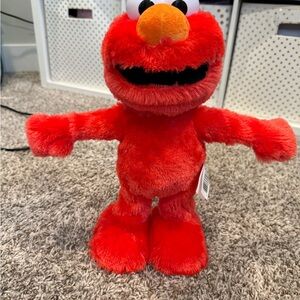 Sesame Street Vibrant Red Elmo Slide Toy